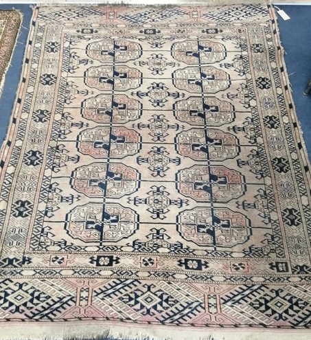 A Bokhara cream and blue ground rug 160 x 120cm